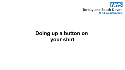 Doing up a button of a shirt Thumbnail